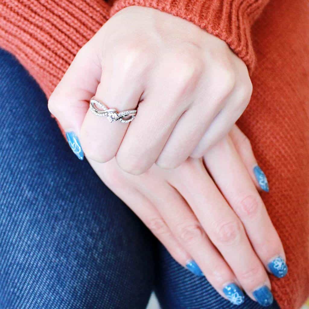 Stainless Steel CZ Round Pave Infinity Crossover Solitaire Ring view 10