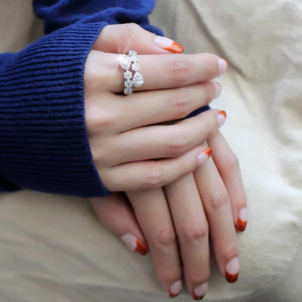 Brass CZ Three-Stone Round Halo Infinity Ring view 5